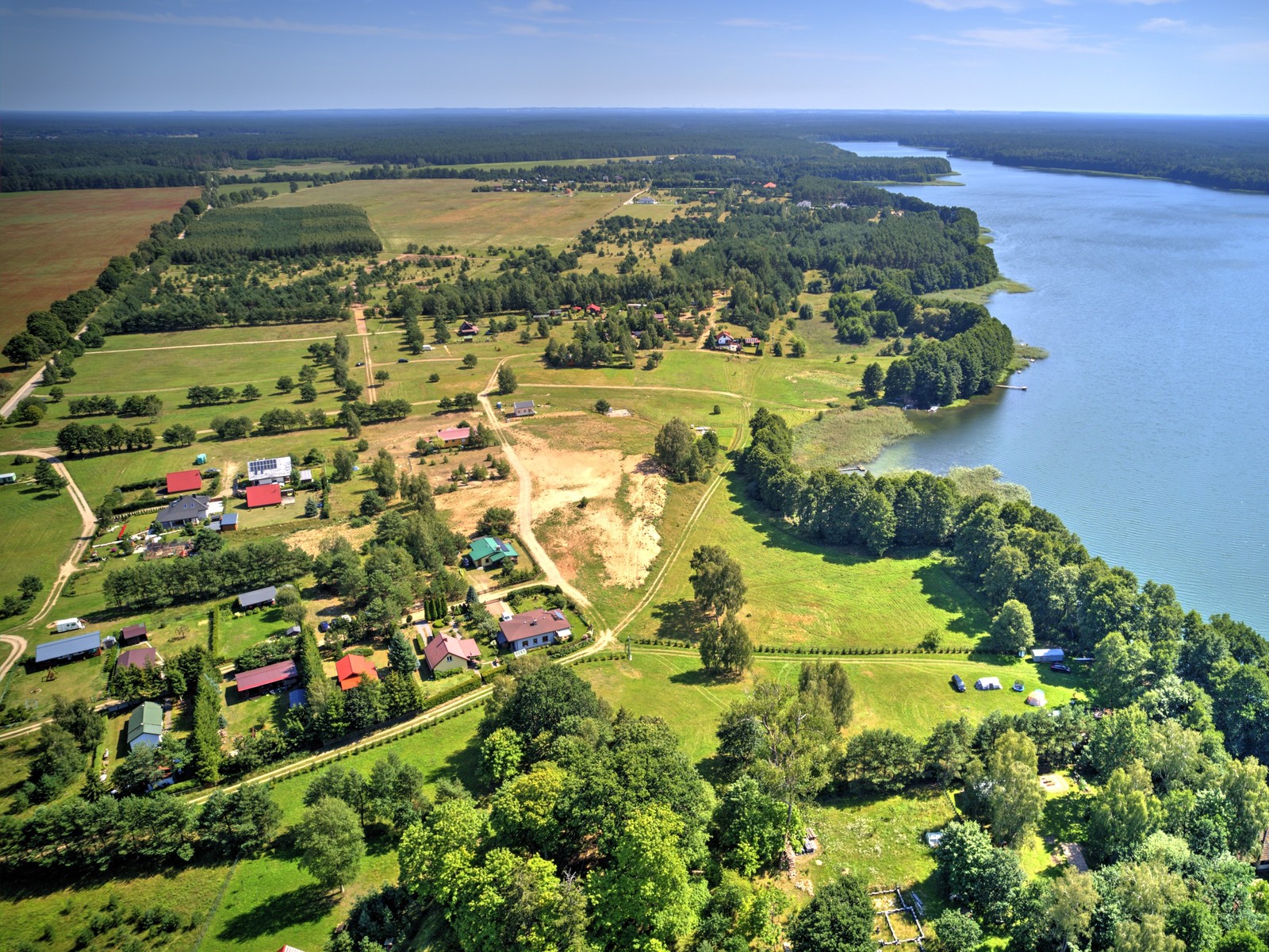 Działka rekreacyjna na sprzedaż przy jeziorze Dołgie